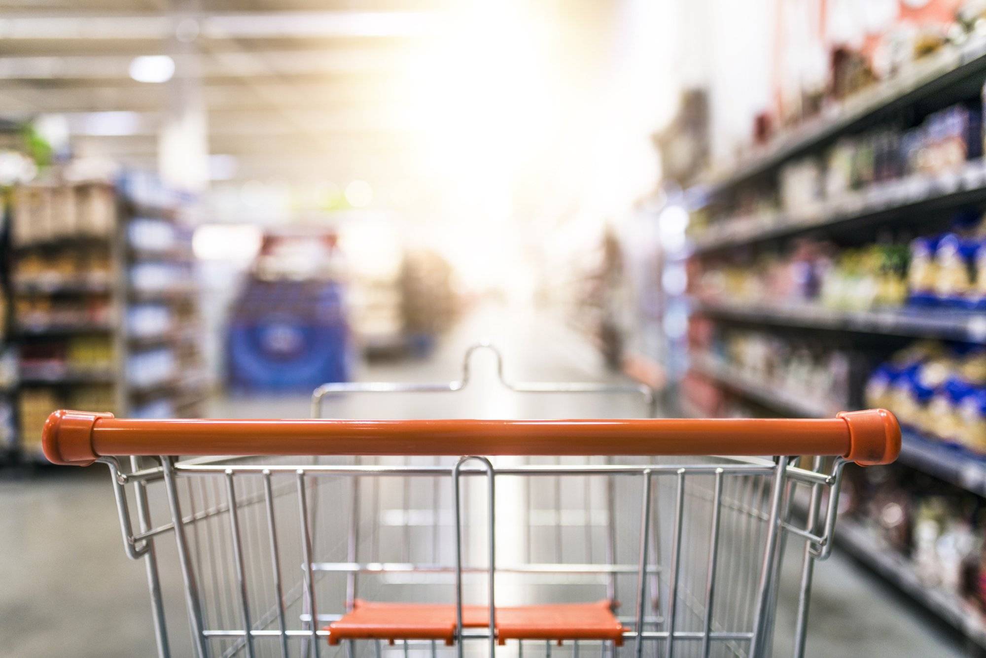 Shopping cart in supermarket Shopping cart in supermarket