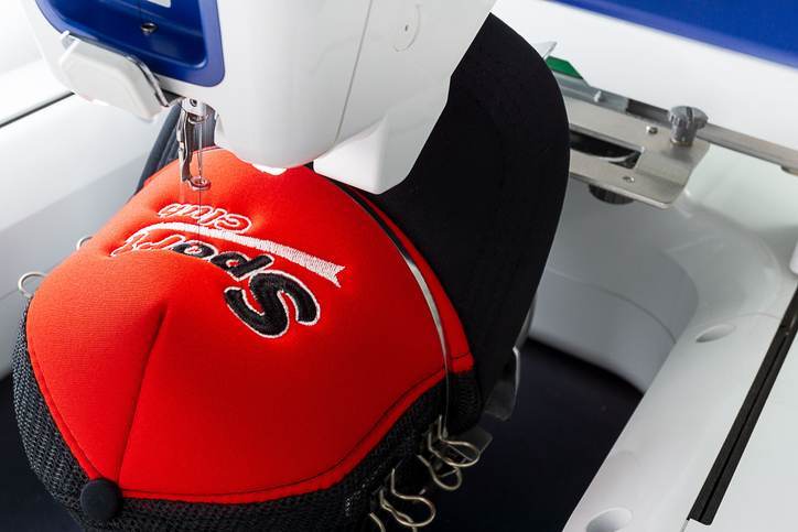 Working embroidery machine close up picture Working embroidery machine close up picture