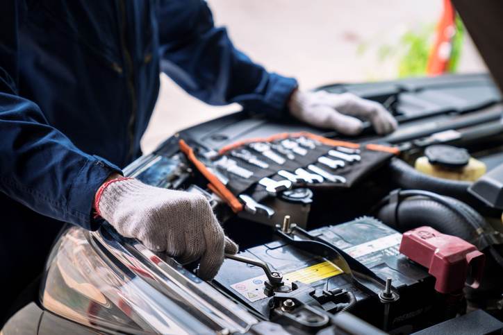 Auto mechanic working in the garage, Service and maintenance and car maintenance. Auto mechanic working in the garage, Service and maintenance and car maintenance.