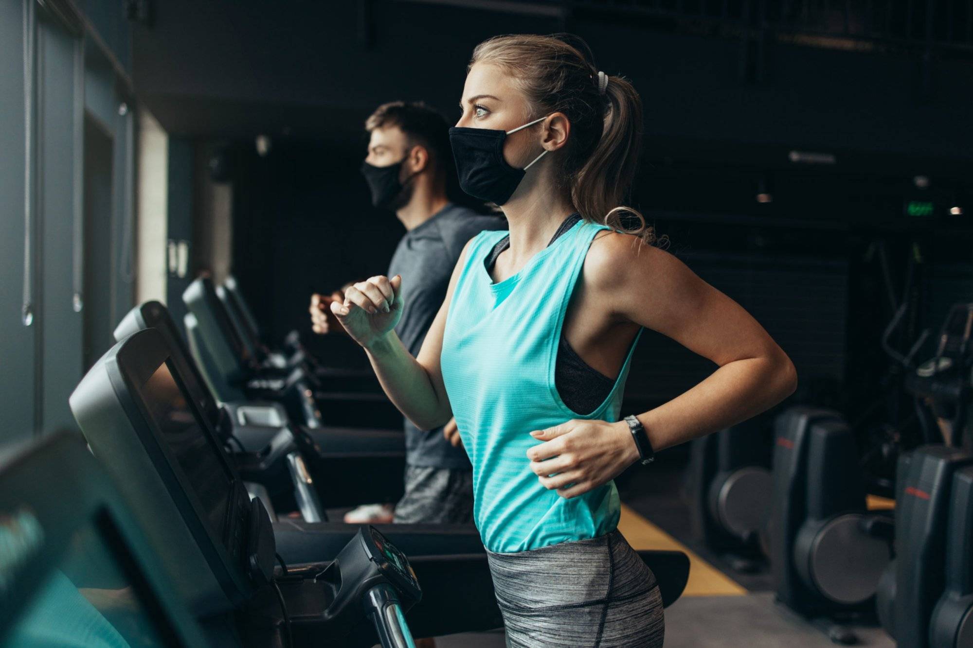 Sporty people exercising in fitness gym