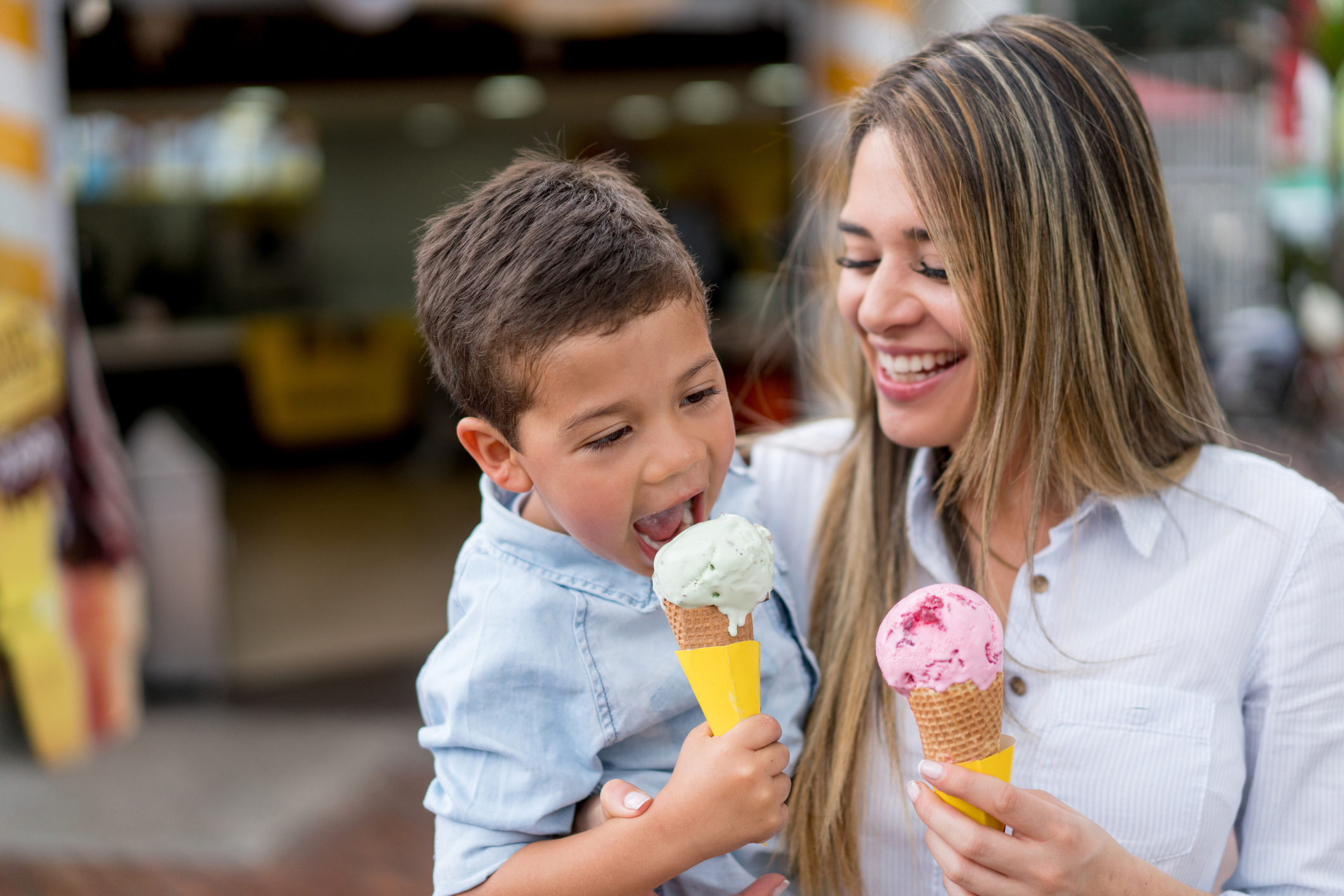 Mother and son eating an ice cream
